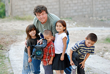 Charles Bailey with school children